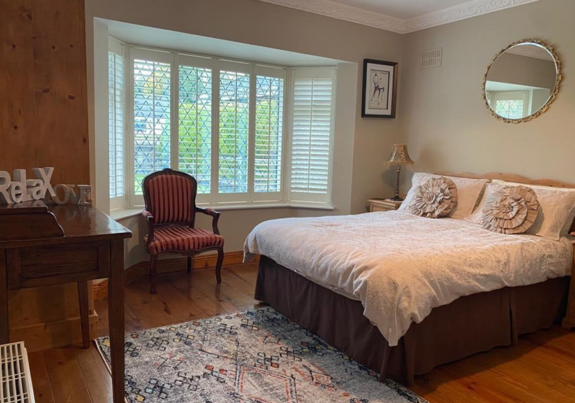 Downstairs king bedroom at Glasson Stone Lodge.